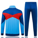Offizieller FC Barcelona Trainingsanzug 25/26 Jacke und Hose in Blau, Ansicht von vorne."
